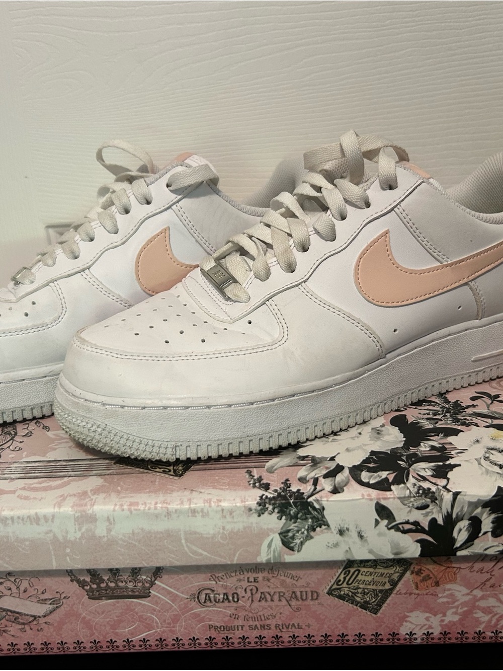 Nike White Low-Top Sneakers with Light Pink Swoosh